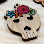 wood skull with flowers