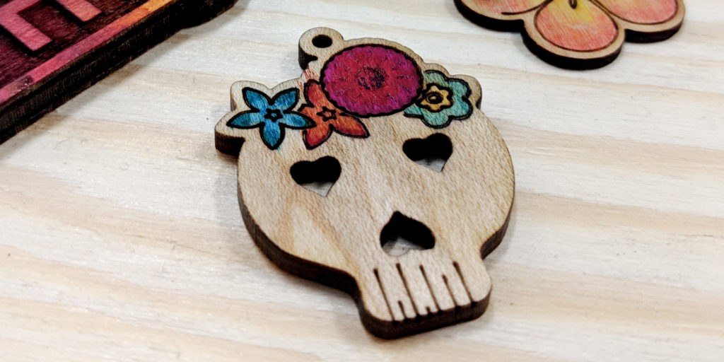 wood skull with flowers